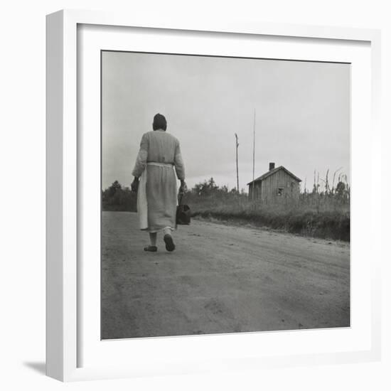 African American Midwife Carrying Her Medical Bag on a Dirt Road in Georgia-null-Framed Photo