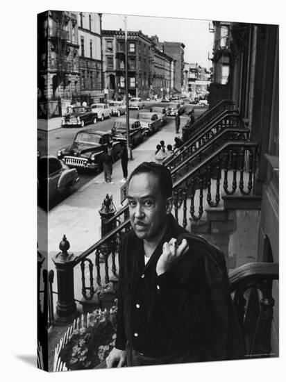 African American Poet/Writer Langston Hughes Standing on the Stoop in Front of His House in Harlem-Robert W^ Kelley-Stretched Canvas