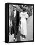 African American Sporting His Sunday Finery Glancing at Frilly Frocked Girl Passing Him on Street-Alfred Eisenstaedt-Framed Stretched Canvas