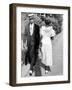 African American Sporting His Sunday Finery Glancing at Frilly Frocked Girl Passing Him on Street-Alfred Eisenstaedt-Framed Photographic Print