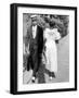 African American Sporting His Sunday Finery Glancing at Frilly Frocked Girl Passing Him on Street-Alfred Eisenstaedt-Framed Photographic Print