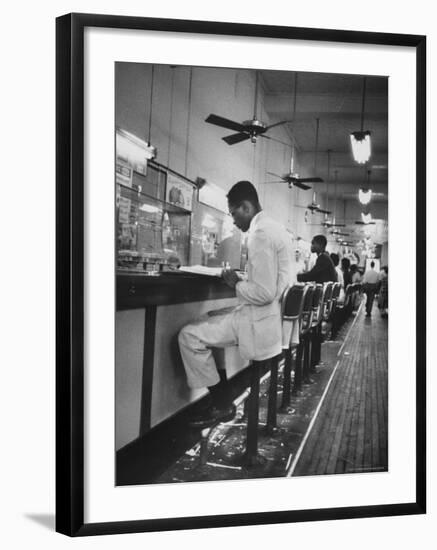 African American Student Virginius B. Thornton During a Sit Down Strike at a Lunch Counter-Howard Sochurek-Framed Photographic Print