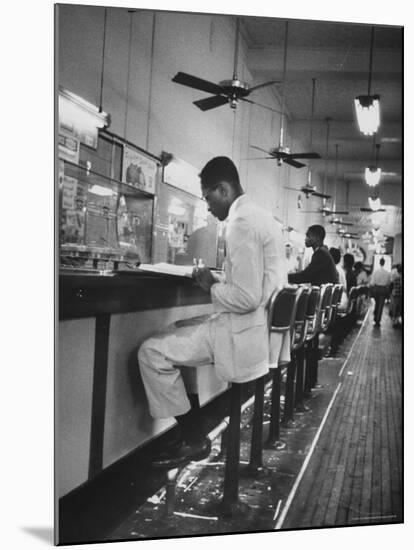 African American Student Virginius B. Thornton During a Sit Down Strike at a Lunch Counter-Howard Sochurek-Mounted Photographic Print