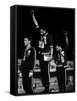 African American Track Star Tommie Smith, John Carlos After Winning Gold and Bronze Olympic Medal-John Dominis-Framed Stretched Canvas