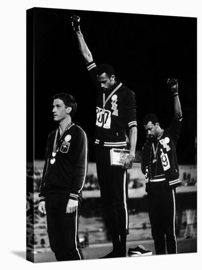 African American Track Star Tommie Smith, John Carlos After Winning Gold and Bronze Olympic Medal-John Dominis-Stretched Canvas