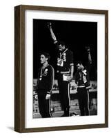 African American Track Star Tommie Smith, John Carlos After Winning Gold and Bronze Olympic Medal-John Dominis-Framed Premium Photographic Print