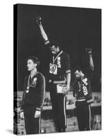 African-American Track Stars Tommie Smith and John Carlos after Winning Olympic Medals-John Dominis-Stretched Canvas