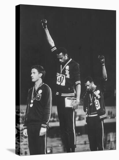 African-American Track Stars Tommie Smith and John Carlos after Winning Olympic Medals-John Dominis-Stretched Canvas