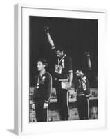 African-American Track Stars Tommie Smith and John Carlos after Winning Olympic Medals-John Dominis-Framed Premium Photographic Print