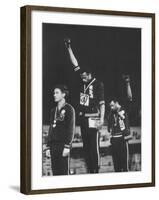 African-American Track Stars Tommie Smith and John Carlos after Winning Olympic Medals-John Dominis-Framed Premium Photographic Print