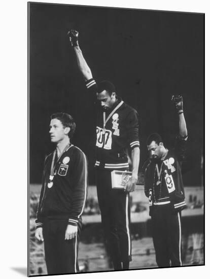 African-American Track Stars Tommie Smith and John Carlos after Winning Olympic Medals-John Dominis-Mounted Premium Photographic Print