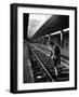 African American Woman Picking Up Debris on Tracks at Union Station-Alfred Eisenstaedt-Framed Photographic Print