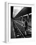 African American Woman Picking Up Debris on Tracks at Union Station-Alfred Eisenstaedt-Framed Photographic Print