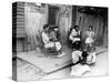 African American Women Sitting on the Porch of their Ramshackle House Watching their Children Play-Alfred Eisenstaedt-Stretched Canvas