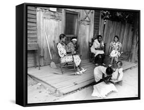 African American Women Sitting on the Porch of their Ramshackle House Watching their Children Play-Alfred Eisenstaedt-Framed Stretched Canvas