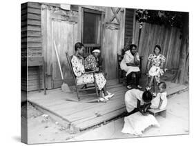 African American Women Sitting on the Porch of their Ramshackle House Watching their Children Play-Alfred Eisenstaedt-Stretched Canvas