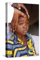 African child blessed by a priest, Lome, Togo-Godong-Stretched Canvas