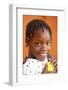 African girl eating an orange, Lome, Togo-Godong-Framed Photographic Print