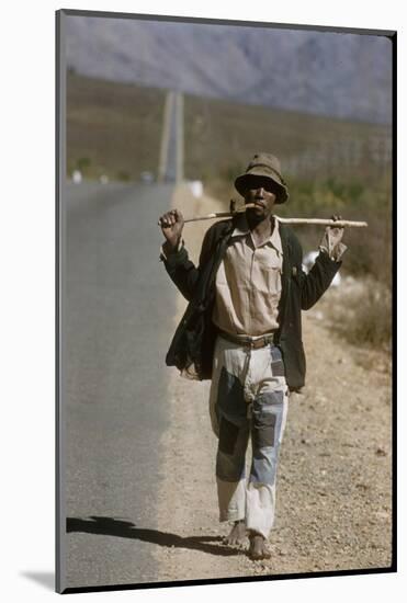 African Man Walks Along Side of Road, Durban, South Africa, 1960-Grey Villet-Mounted Photographic Print