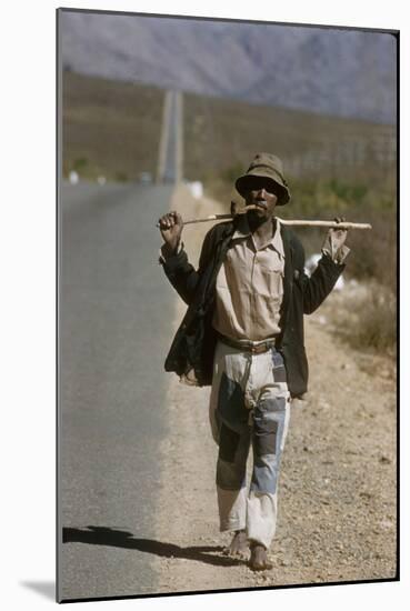 African Man Walks Along Side of Road, Durban, South Africa, 1960-Grey Villet-Mounted Photographic Print