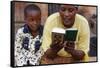 African mother reading the Koran, Lome, Togo-Godong-Framed Stretched Canvas