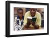 African mother reading the Koran, Lome, Togo-Godong-Framed Photographic Print