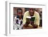 African mother reading the Koran, Lome, Togo-Godong-Framed Photographic Print