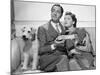 After the Thin Man by W.S. Van Dyke with Myrna Loy, William Powell, the dog Asta, 1936 (b/w photo)-null-Mounted Photo