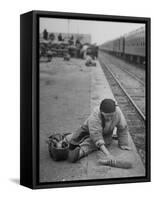 Aged Refugee Fighting Hunger, Sweeps Up Spilled Rice on the Railroad Station Platform-Jack Birns-Framed Stretched Canvas