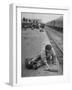 Aged Refugee Fighting Hunger, Sweeps Up Spilled Rice on the Railroad Station Platform-Jack Birns-Framed Photographic Print