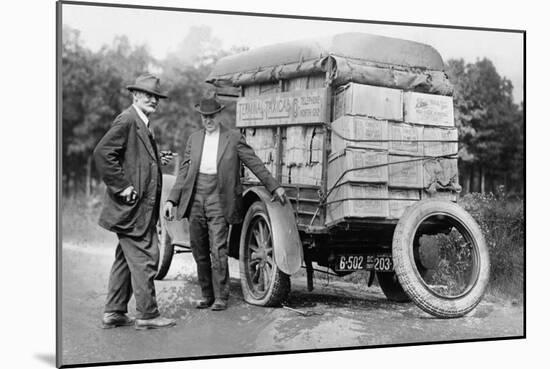 Agents Capture a Vehicle Loaded with Liquor as it Got a Flat Tire-null-Mounted Art Print