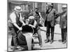 Agents pour liquor into sewer following a raid during the height of prohibition, New York, 1921-null-Mounted Photographic Print