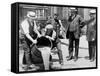 Agents pour liquor into sewer following a raid during the height of prohibition, New York, 1921-null-Framed Stretched Canvas