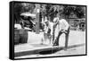 Agents Pouring Liquor Down a Sewer on the Street-null-Framed Stretched Canvas