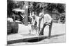 Agents Pouring Liquor Down a Sewer on the Street-null-Mounted Premium Giclee Print