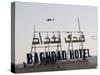 AH-64 Apache in Flight over the Baghdad Hotel in Central Baghdad, Iraq-Stocktrek Images-Stretched Canvas