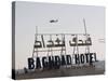 AH-64 Apache in Flight over the Baghdad Hotel in Central Baghdad, Iraq-Stocktrek Images-Stretched Canvas