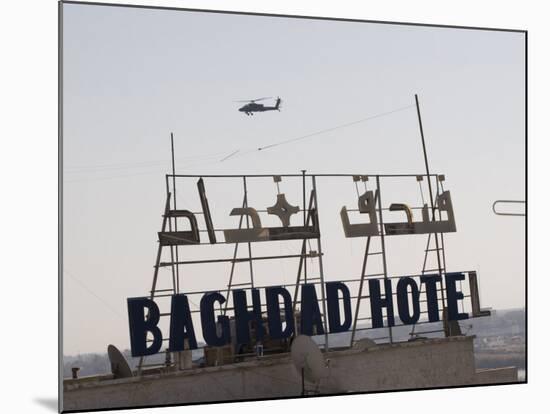 AH-64 Apache in Flight over the Baghdad Hotel in Central Baghdad, Iraq-Stocktrek Images-Mounted Photographic Print