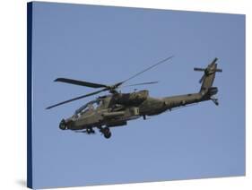 AH-64 Apache in Flight over the Baghdad Hotel in Central Baghdad, Iraq-Stocktrek Images-Stretched Canvas