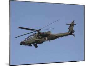 AH-64 Apache in Flight over the Baghdad Hotel in Central Baghdad, Iraq-Stocktrek Images-Mounted Photographic Print