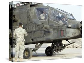 AH-64 Apache Preparing to Leave its Pad for a Mission-Stocktrek Images-Stretched Canvas