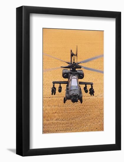 AH-64A Apache flies over fields-null-Framed Art Print