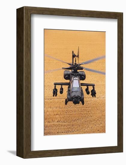 AH-64A Apache flies over fields-null-Framed Art Print