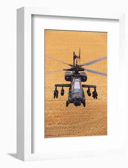 AH-64A Apache flies over fields-null-Framed Art Print