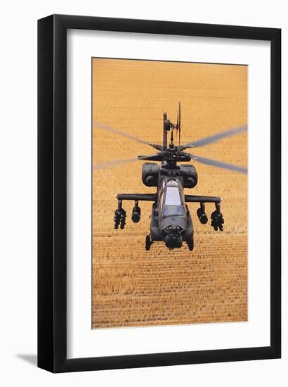 AH-64A Apache flies over fields-null-Framed Art Print