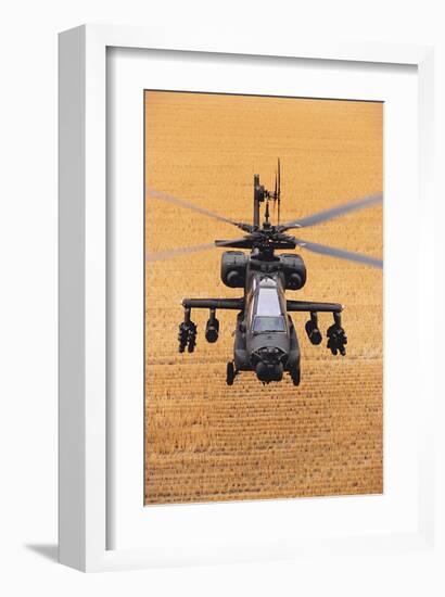 AH-64A Apache flies over fields-null-Framed Art Print
