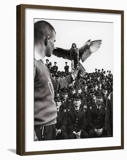 Air Force Academy Cadets Watching Handler Performing with the Air Force Mascot, a Falcon-Leonard Mccombe-Framed Photographic Print