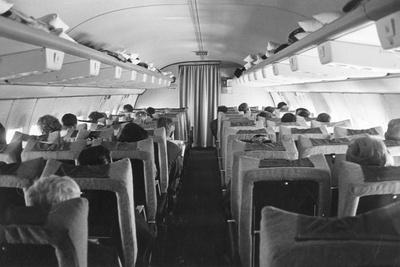 https://imgc.allpostersimages.com/img/posters/air-travel-1960s_u-L-Q106UUZ0.jpg?artPerspective=n