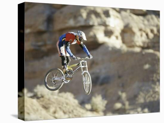Airborne Bicyclist-null-Stretched Canvas