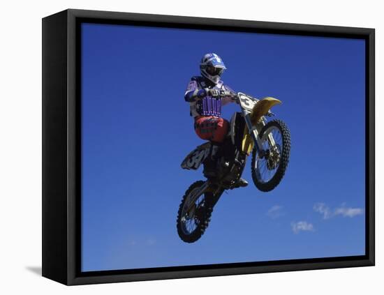 Airborne Motorcyclist-null-Framed Stretched Canvas